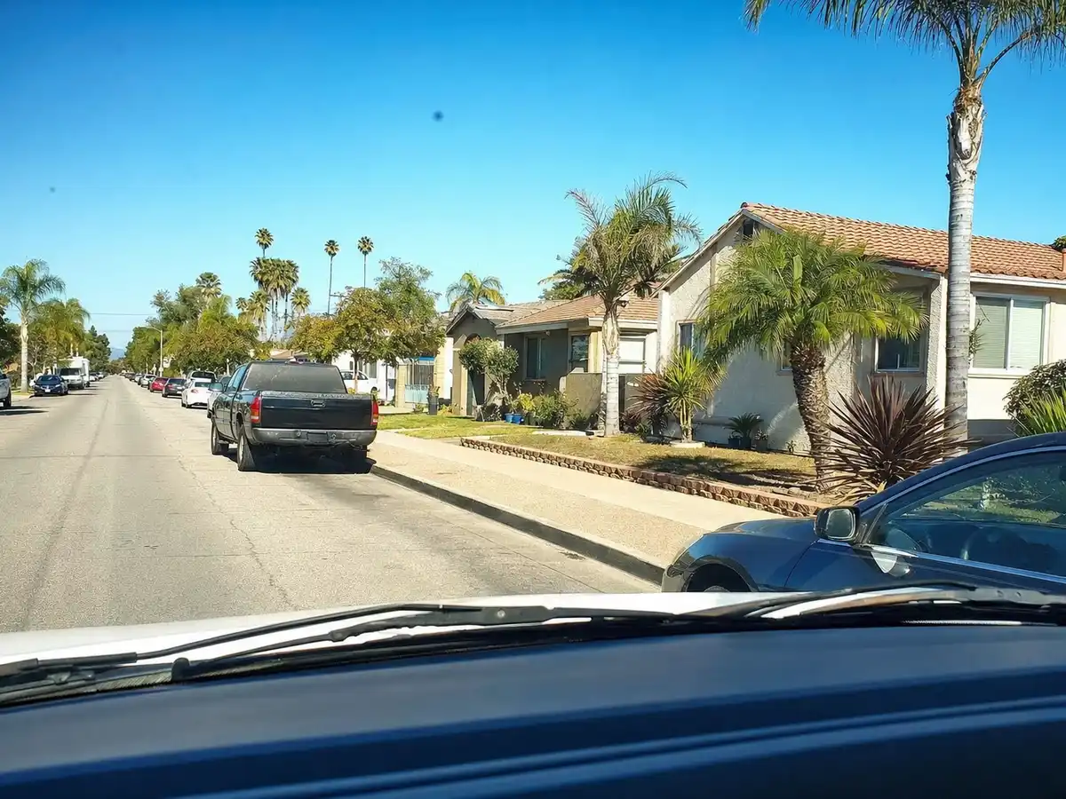 Service van arriving on a Panorama City, CA street — local same-day coverage